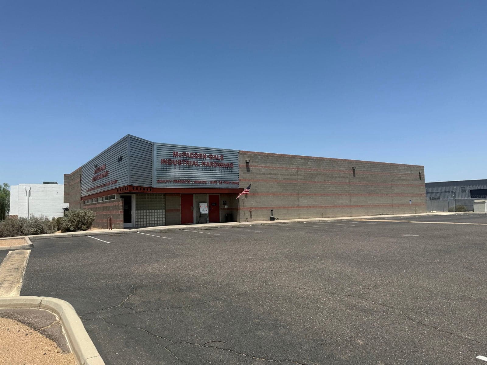 Aerial view of industrial property at 4647 S 32nd St in Phoenix, Arizona showing warehouse building, access points, and surrounding site area.